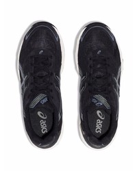 schwarze und weiße Sportschuhe von Asics