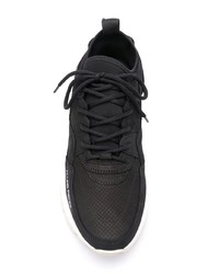 schwarze und weiße Sportschuhe von Filling Pieces