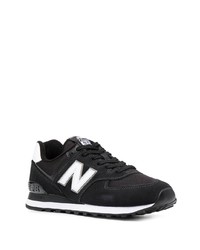 schwarze und weiße Sportschuhe von New Balance