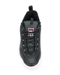 schwarze und weiße Sportschuhe von Fila