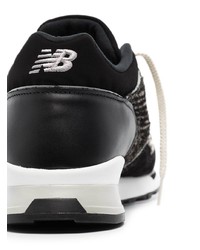 schwarze und weiße Sportschuhe von New Balance