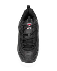 schwarze und weiße Sportschuhe von Fila