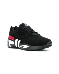 schwarze und weiße Sportschuhe von Fila