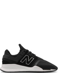 schwarze und weiße Sportschuhe von New Balance