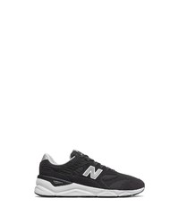 schwarze und weiße Sportschuhe von New Balance