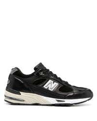 schwarze und weiße Sportschuhe von New Balance