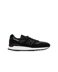 schwarze und weiße Sportschuhe von New Balance