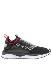 schwarze und weiße Sportschuhe von Puma