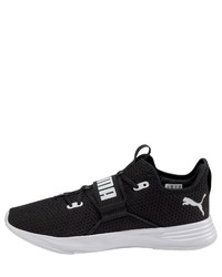 schwarze und weiße Sportschuhe von Puma