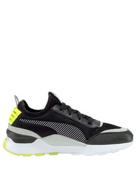 schwarze und weiße Sportschuhe von Puma