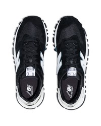 schwarze und weiße Sportschuhe von New Balance