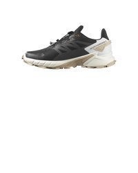 schwarze und weiße Sportschuhe von Salomon