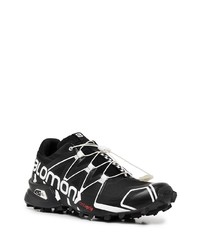 schwarze und weiße Sportschuhe von Salomon S/Lab