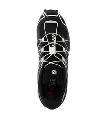 schwarze und weiße Sportschuhe von Salomon S/Lab