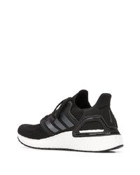 schwarze und weiße Sportschuhe von adidas