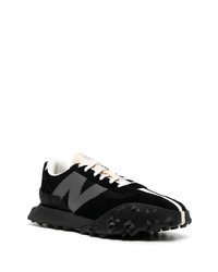 schwarze und weiße Sportschuhe von New Balance