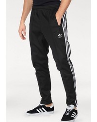 schwarze und weiße vertikal gestreifte Jogginghose von adidas Originals