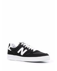 schwarze und weiße Wildleder niedrige Sneakers von New Balance