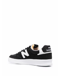 schwarze und weiße Wildleder niedrige Sneakers von New Balance