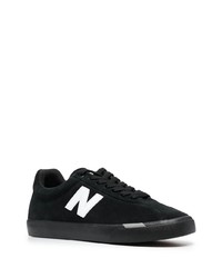 schwarze und weiße Wildleder niedrige Sneakers von New Balance