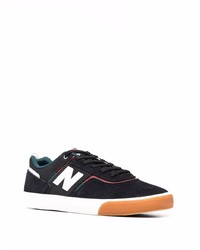 schwarze und weiße Wildleder niedrige Sneakers von New Balance