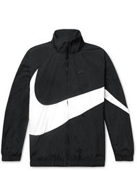 schwarze und weiße Windjacke von Nike
