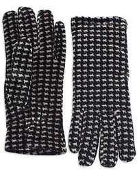 schwarze und weiße Wollhandschuhe mit geometrischem Muster