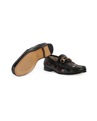 schwarze verzierte Leder Slipper von Gucci