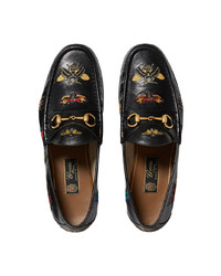 schwarze verzierte Leder Slipper von Gucci