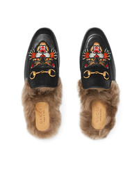 schwarze verzierte Leder Slipper von Gucci