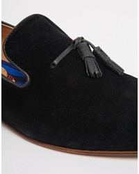 schwarze Wildleder Slipper mit Quasten