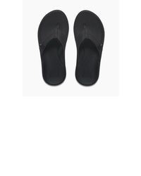 schwarze Zehensandalen von Reef