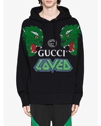 schwarzer bedruckter Pullover mit einem Kapuze von Gucci