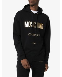 schwarzer bedruckter Pullover mit einem Kapuze von Moschino