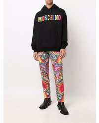 schwarzer bedruckter Pullover mit einem Kapuze von Moschino