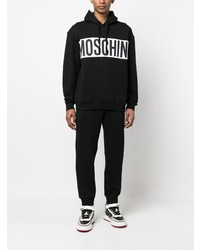 schwarzer bedruckter Pullover mit einem Kapuze von Moschino