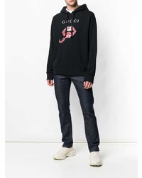 schwarzer bedruckter Pullover mit einem Kapuze von Gucci