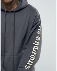 schwarzer bedruckter Pullover mit einem Kapuze von Asos