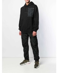 schwarzer bedruckter Pullover mit einem Kapuze von Maharishi