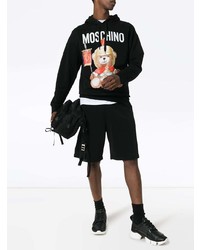 schwarzer bedruckter Pullover mit einem Kapuze von Moschino