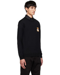 schwarzer bedruckter Pullover mit einem Rundhalsausschnitt von Moschino