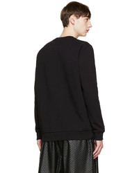 schwarzer bedruckter Pullover mit einem Rundhalsausschnitt von Givenchy