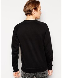 schwarzer bedruckter Pullover mit einem Rundhalsausschnitt von Cheap Monday