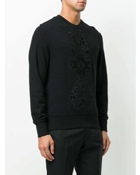 schwarzer bedruckter Pullover mit einem Rundhalsausschnitt von Alexander McQueen