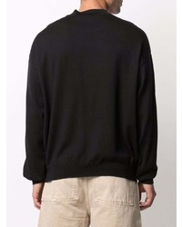 schwarzer bedruckter Pullover mit einem Rundhalsausschnitt von Moschino
