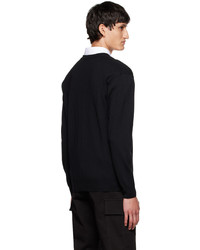 schwarzer bedruckter Pullover mit einem V-Ausschnitt von Moschino