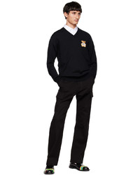 schwarzer bedruckter Pullover mit einem V-Ausschnitt von Moschino