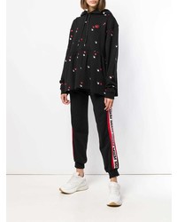 schwarzer bedruckter Pullover mit einer Kapuze von McQ Alexander McQueen