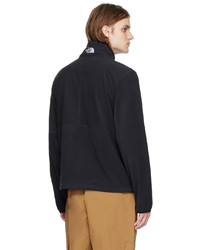 schwarzer Fleece-Pullover mit einem Reißverschluss am Kragen von The North Face