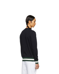 schwarzer horizontal gestreifter Pullover mit einem Rundhalsausschnitt von Moncler